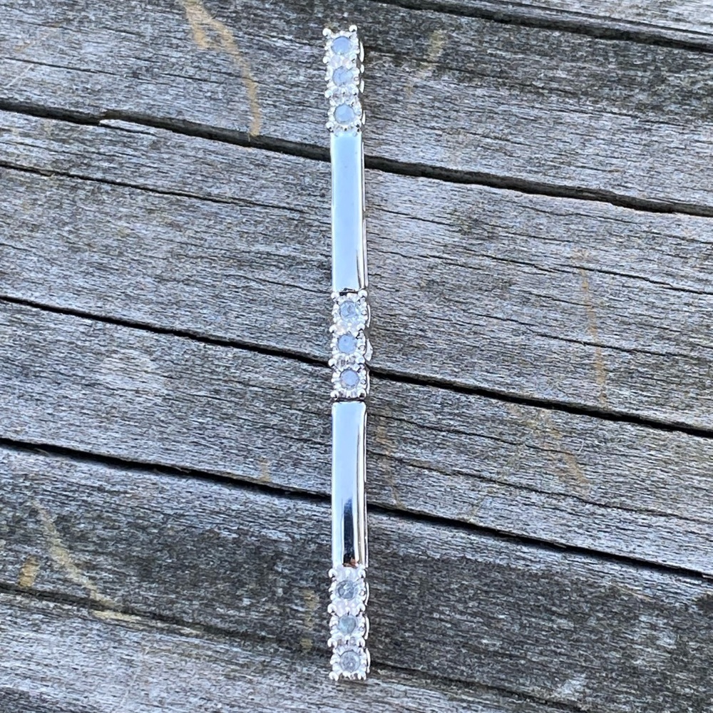 Genuine Diamond 10k white gold linear pendant with center hinge stamped